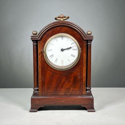 ANTIQUE INLAID SHELF CLOCK | Inlaid wood case housing a white enamel face with Roman numeral markers, no apparent signature or markings....