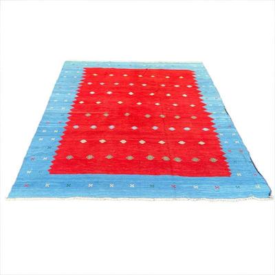 GEOMETRIC FLAT WOVEN CARPET | Central red field with a vibrant blue border. - l. 152 x w. 116 in
