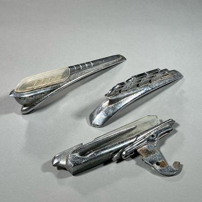 (3PC) STREAMLINE MODERNE HOOD ORNAMENTS | including; light fixture, intact glass ornaments etc. - l. 14.25 x w. 1.5 x h. 3.5 in (largest)
