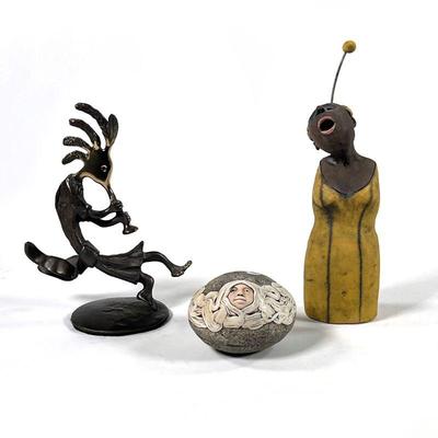 (3PC) KUBALE & OTHER OBJECTS | Including a Nancy Kubale sculpture of a woman dressed in yellow, a two-tone brass sculpture of a figure...