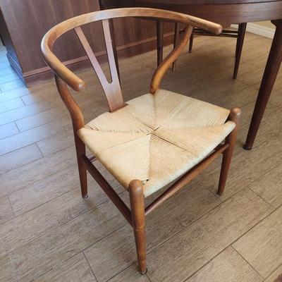 Mid century modern dining table (with 3 leaves) and 2 chairs. Rush seats have been re-done.