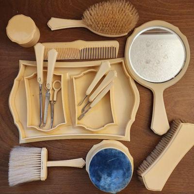 Large celluloid vanity dresser set.