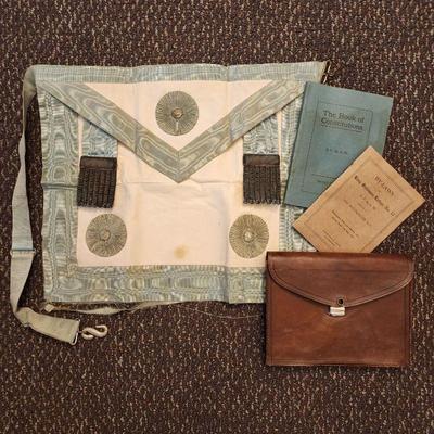 Antique masonic apron, pouch and manuals.
