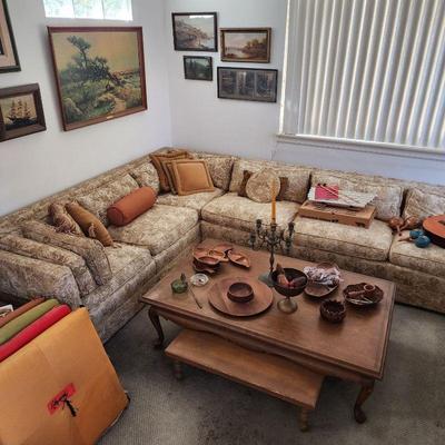 Mid Century Modern Sectional sofa with original upholstery, vintage cocktail table and fondue table. Vintage monkey pod serving pieces.