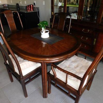 Drexel dining table and chairs with extra leaf.