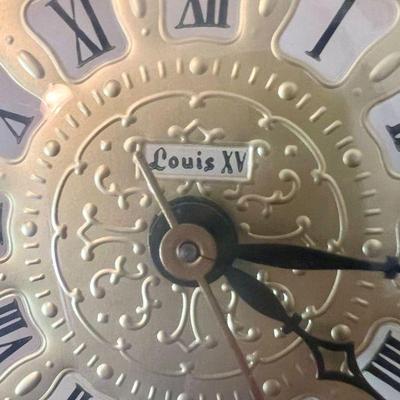 Small brass Louis XV mantle clock 