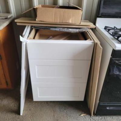 #15054 â€¢ 2 Hampton Bay Wooden Cabinets
