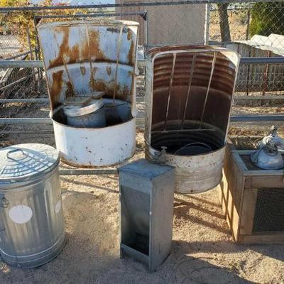 #1000 â€¢ (2) Feeders, Metal Trash Can With Lid, & More
