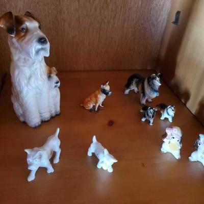 #10016 â€¢ (9) Ceramic Dog Statues
