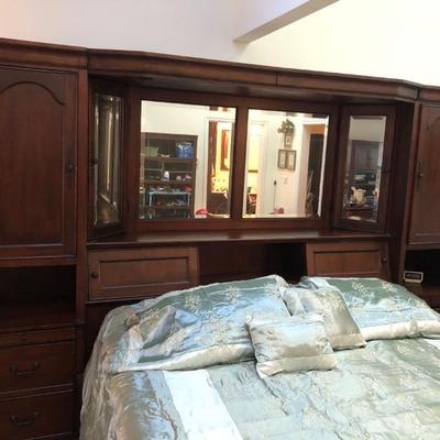 King size bed with wall unit