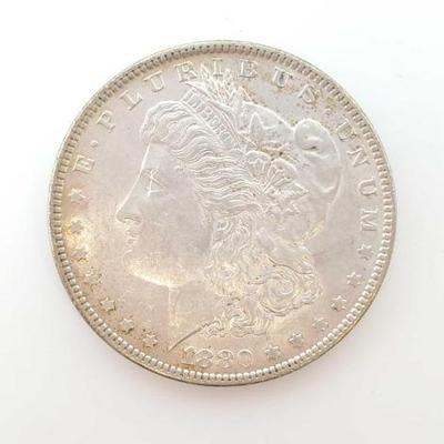 #648 â€¢ 1880 Morgan Silver Dollar
