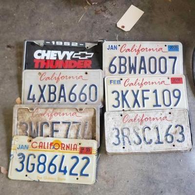 #1232 â€¢ (7) Liscense Plates & (3) Liscense Plate Holders
