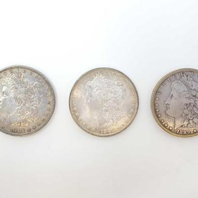 #670 â€¢ (3)1882-1901 Morgan Silver Dollars
