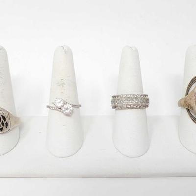 #332 â€¢ (4) Sterling Silver Rings with Rhinestone Accents, 25g
