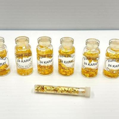 #402 â€¢ (6) 24k Gold Flake Bottles and (1) Gold Flake Tube
