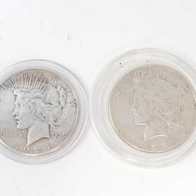 #702 â€¢ (2) 1923 & 1924 Silver Peace Dollars

