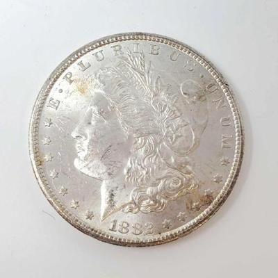 #602 â€¢ 1882 Morgan Silver Dollar
