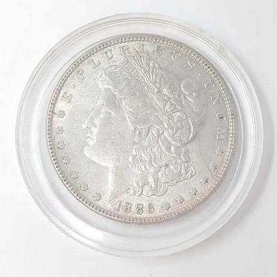 #666 â€¢ 1886 Morgan Silver Dollar

