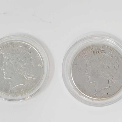 #704 â€¢ (2) 1922-1923 Silver Peace Dollars
