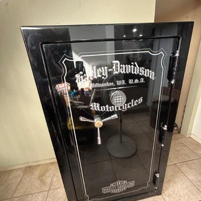 100th Anniversary Harley Davidson Gun Safe
Black with silver lettering and design 
Adjustable shelving 
Holds 25 plus
Includes xtra...