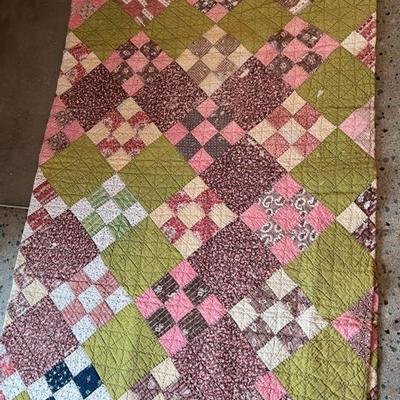 Antique Quilt Carefully Wrapped In Tissue
