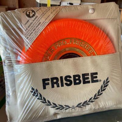 NEW / OLD INVENTORY THIS PRO FRISBEE HAS A CANVAS BAG AND 2 FRISBEES!
