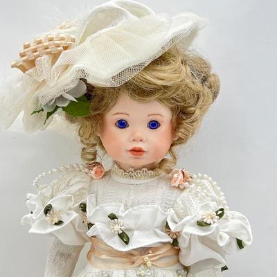 Sweet 15â€ Porcelain Doll in Romantic Style Victorian Dress Vivid Violet Eyes and a Beautiful Cherub Face