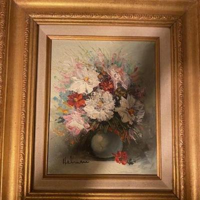 One of a pair of matching size and frame floral oil Paintings