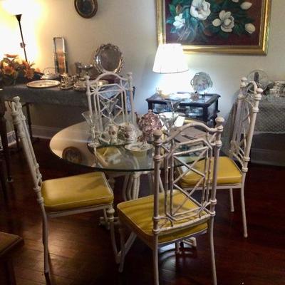 Gorgeous glass topped vintage table with 4 chairs