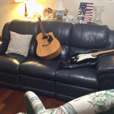 Green sofa , guitars