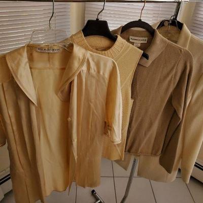 (4) Beige Tops feat. Garfield & Marks, Paul Alexander
Variety of shirts and one Garfield & Marks coat with matching skirt. Tops include...