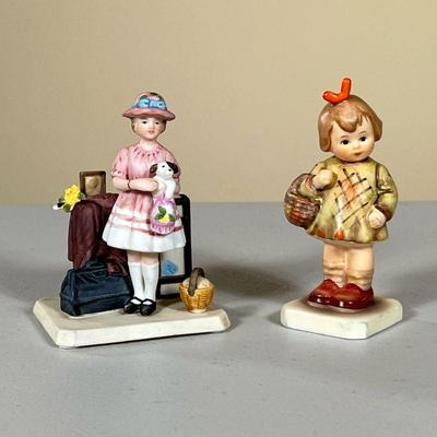 (2PC) HUMMEL & NORMAN ROCKWELL FIGURINES | Including: â€œI brought you a giftâ€ Hummel figurine, and â€œVacations Overâ€ figurine...
