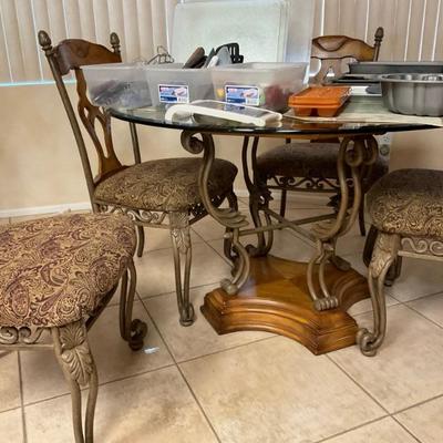 Table set has 3 matching bar stools