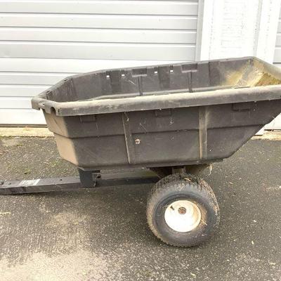 REEM238 Sears Dump Cart	Model# 610244200. Does have a quick release for easy dumping. Does have a flat tire. Looks like you can tow with...