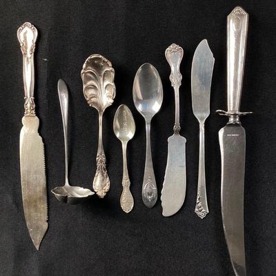 MAHA528 Assorted Sterling Silver Flatware & Sterling/Stainless Knife	This assorted lot is 8 pieces. The six smaller pieces of flatware...