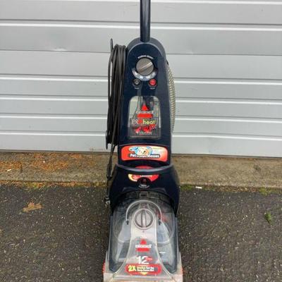 REEM230 Bissell Pro Heat Carpet Cleaner	12amps, dual dirt lifter power brushes. Has the Pet 2x attachment. Model# 9400-4. Turns on & runs...