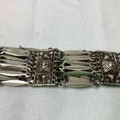 JSHI222 Taxco Mexico Sterling Silver Bracelet	Stamped 925 Sterling, believed to be in the 1940's. Mayan Aztec pattern reminiscent of the...