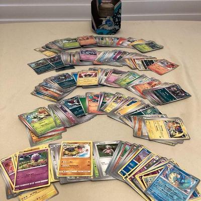 CCS153 Over 500 PokÃ©mon Trading Cards With Storage Tin