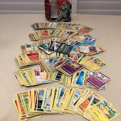 CCS175 Over 600 PokÃ©mon Trading Cards In Storage Tin
