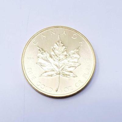 #134 â€¢ 1 Oz Canadian Maple Leaf .9999 Gold Coin
