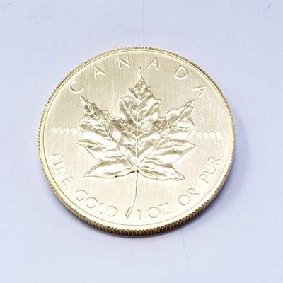 #138 â€¢ 1 Oz Canadian Maple Leaf .9999 Gold Coin
