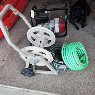 #2072 â€¢ Hose reel and 2 New Hoses
