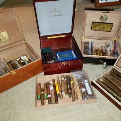 #10046 • 4 Boxes of Approx 74 Cigars, Matches, And Leather Cigar Holder