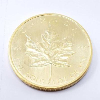 #122 â€¢ 1 Oz Canadian Maple Leaf .9999 Gold Coin
