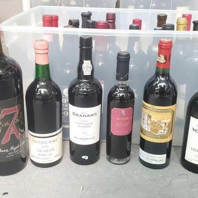 #1032 â€¢ Collection of Sealed Bottles
