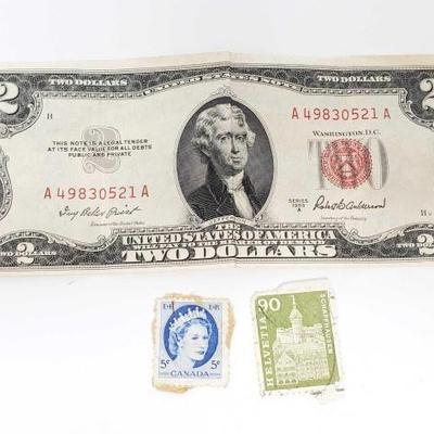 #613 â€¢ One 1953 2 Dollar Bill, and 2 Postage Stamps
