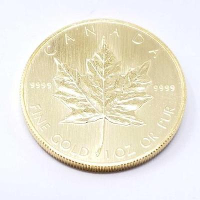 #142 â€¢ 1 Oz Canadian Maple Leaf .9999 Gold Coin
