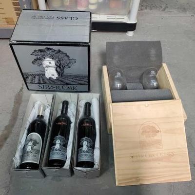 #1050 â€¢ Collection of Silver Oak Bottles and (2) Glasses
