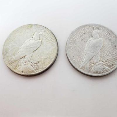 #242 â€¢ 1923 And 1925 Silver Peace Dollars
