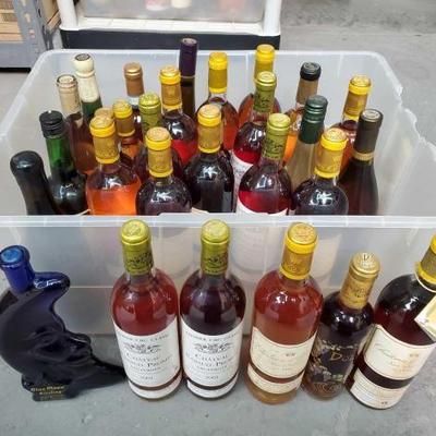 #1038 â€¢ Collection of Sealed Bottles
